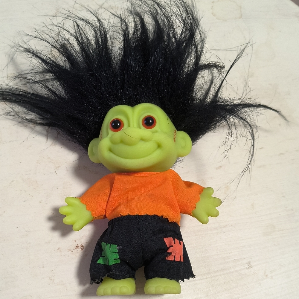 Green Troll Doll with Black Hair and Orange Shirt